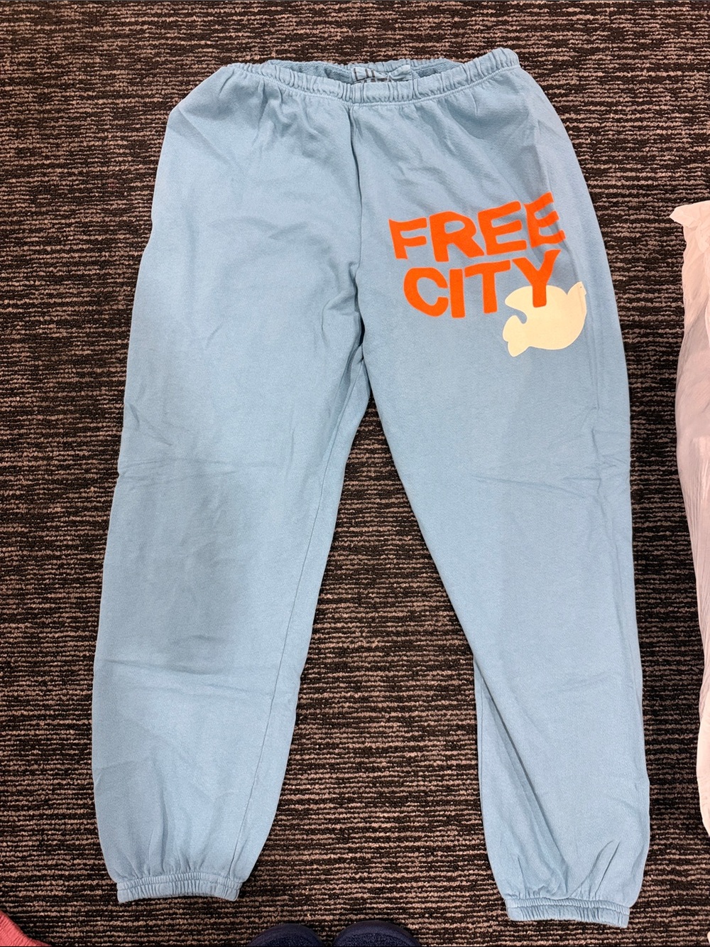 freecity Kids Sky Blue Sweatpants with Orange Logo and Cream Dove